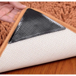 Set 4 Triunghiuri Anti Alunecare  Auto Adezive  pentru Fixare Covor  16cm Set 4 Triunghiuri Anti Alunecare  Auto Adezive  pentru Fixare Covor  16cm