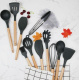 Set 12 ustensile de bucatarie Lemn/Silicon Negru
