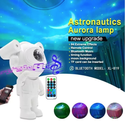 Proiector LED in forma de astronaut cu sunete si lumini stickere autoadezive conexiune Bluetooth