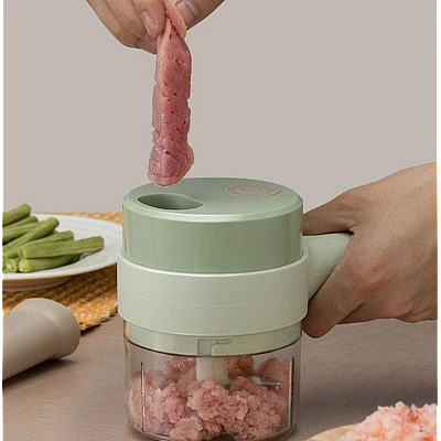 Aparat de tocat si feliat automat verde pentru fructe legume si condimente ACUMULATOR Aparat de tocat si feliat automat verde pentru fructe legume si condimente ACUMULATOR