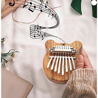 Mini Kalimba cu 8 Clape si Urechiuse portabil ideal pentru incepatori si copii Mini Kalimba cu 8 Clape si Urechiuse portabil ideal pentru incepatori si copii