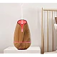 Umidificator / Difuzor aromaterapie model lemn natur cu LED 7 culori Umidificator / Difuzor aromaterapie model lemn natur cu LED 7 culori