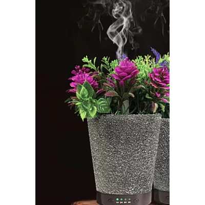 Umidificator/Difuzor aromatizator in forma de ghiveci cu flori 7 culori programabil oprire automata Umidificator/Difuzor aromatizator in forma de ghiveci cu flori 7 culori programabil oprire automata