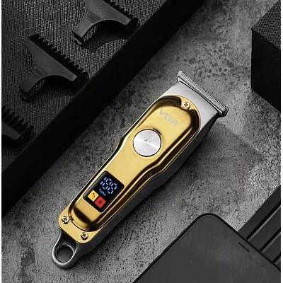 Aparat de tuns pentru contur VGR V290 avand incarcare USB 3 piepteni ajustare lungime Aparat de tuns pentru contur VGR V290 avand incarcare USB 3 piepteni ajustare lungime