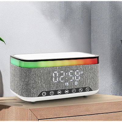 Boxa Bluetooth KP 559 3 in 1 cu incarcator wireless ceas si iluminare LED 10W