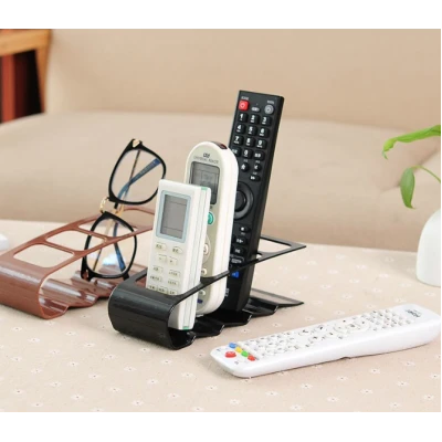Suport Telecomenzi mic plastic cu 4